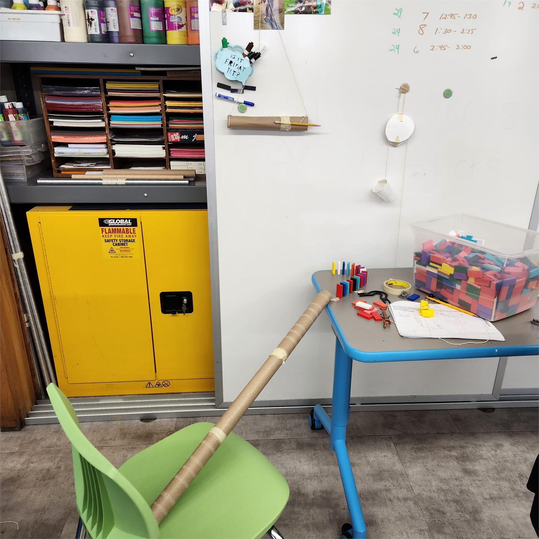 Domino and ramp elements in a Rube Goldberg machine