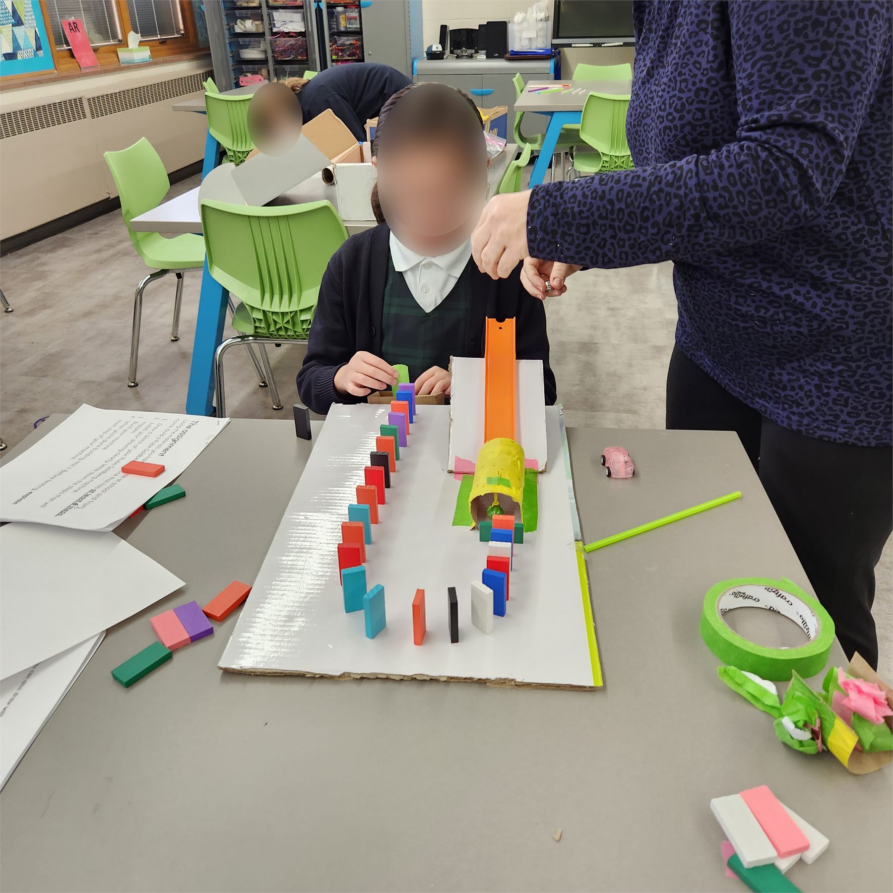 Completed Rube Goldberg machine displayed in the STEAM classroom